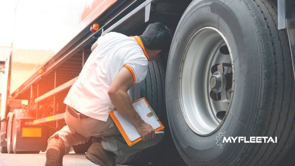 person with clipboard looking under a truck